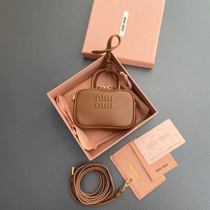 MICRO BAG KEYCHAIN 11 IN CAPE PALLISER BROWN CALFSKIN EMBOSSED LOGO