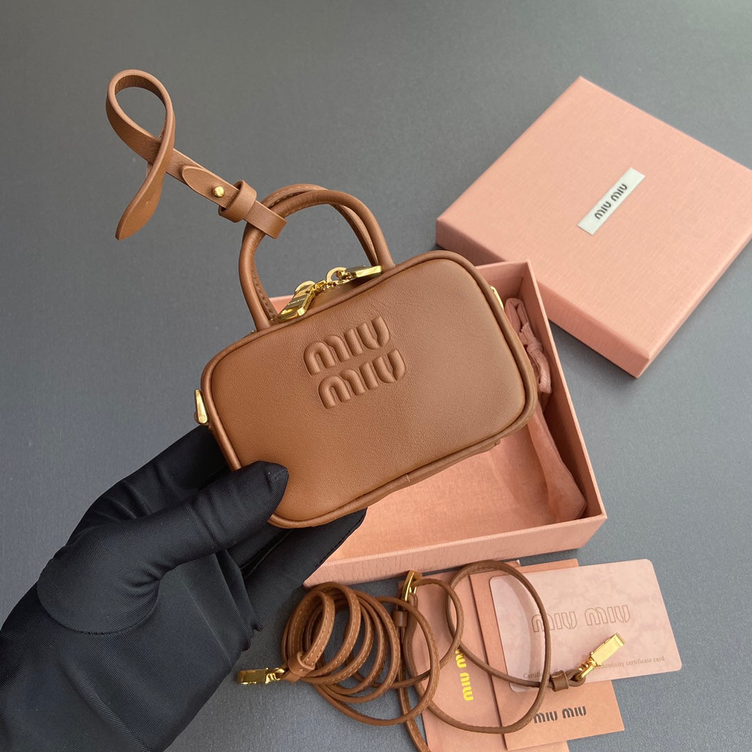 MICRO BAG KEYCHAIN 11 IN CAPE PALLISER BROWN CALFSKIN EMBOSSED LOGO