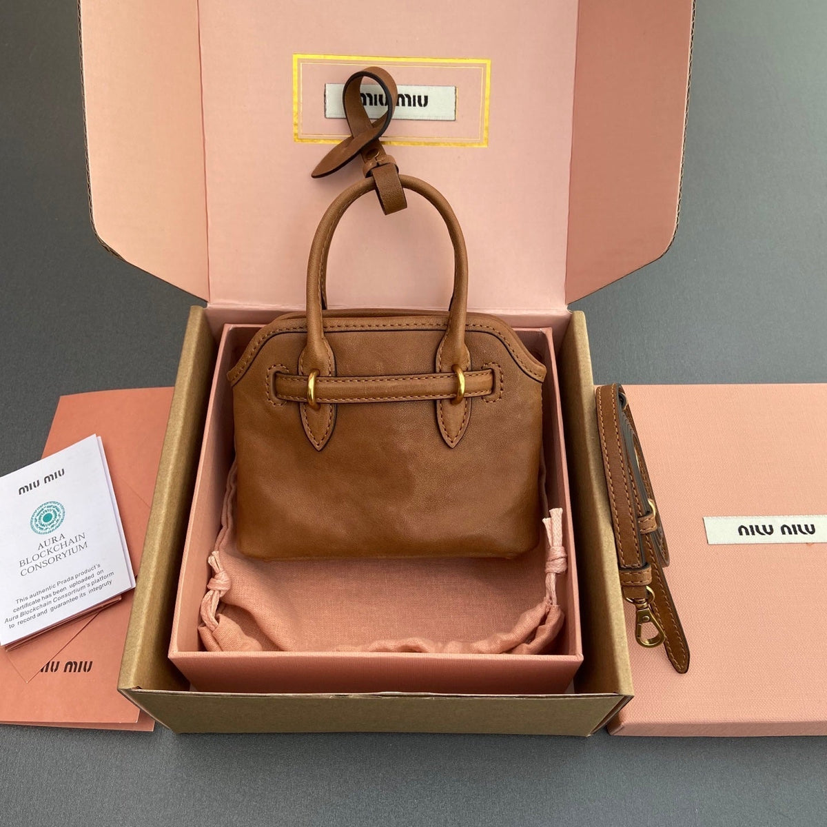 AVENTURE BAG 13 IN SANTA FE BROWN SHINY CALFSKIN