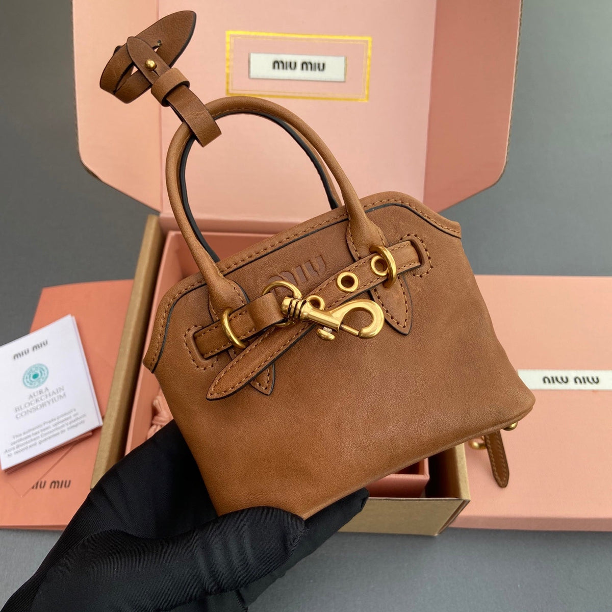 AVENTURE BAG 13 IN SANTA FE BROWN SHINY CALFSKIN