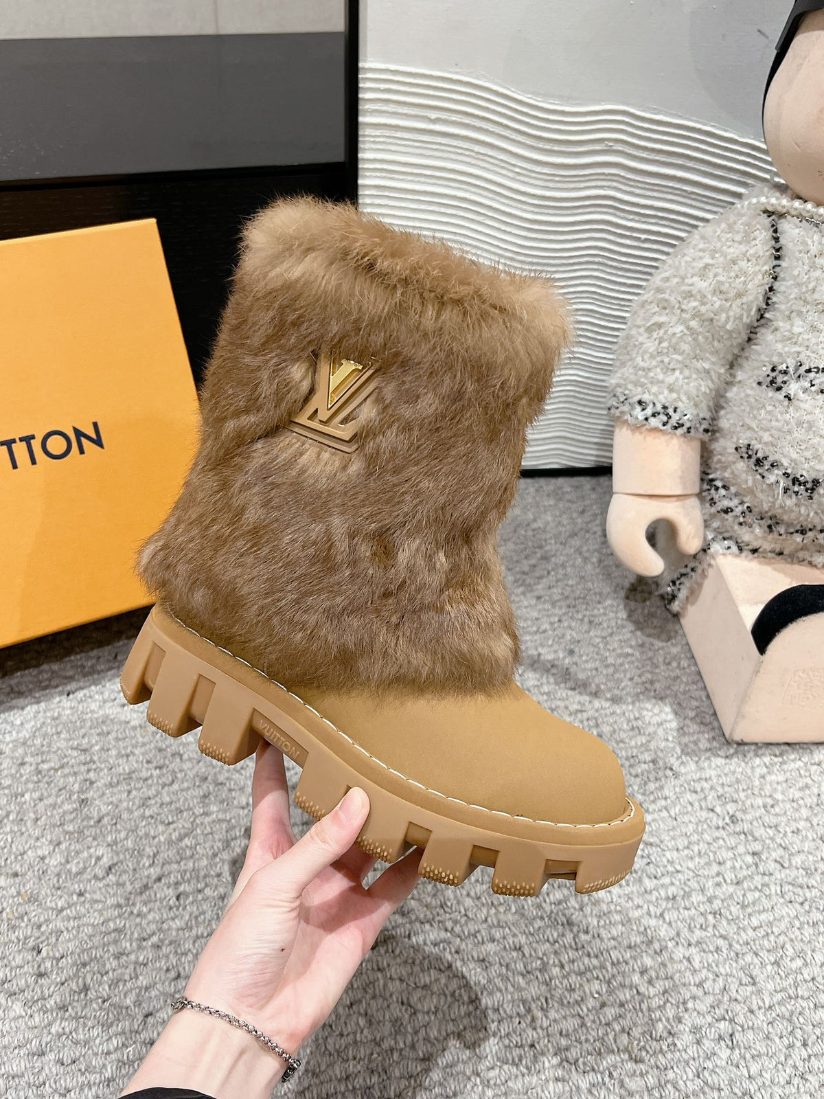 ANKLE BOOTS IN PEANUT BROWN CALFSKIN WITH MINK FUR