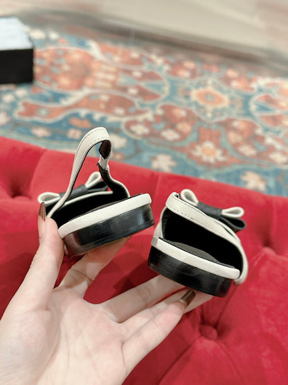 CASSANDRA SLINGBACK FLAT IN WHITE MIX BLACK SMOOTH LAMBSKIN