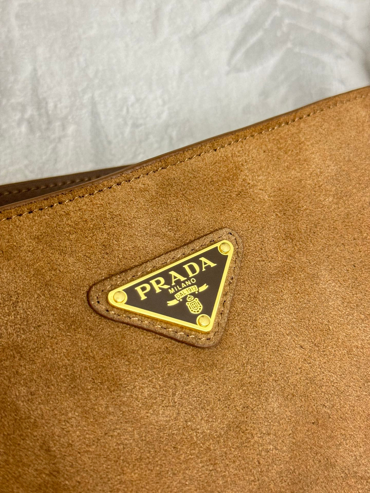 BUCKET BAG 22 IN RUSSET BROWN SOFT SUEDE