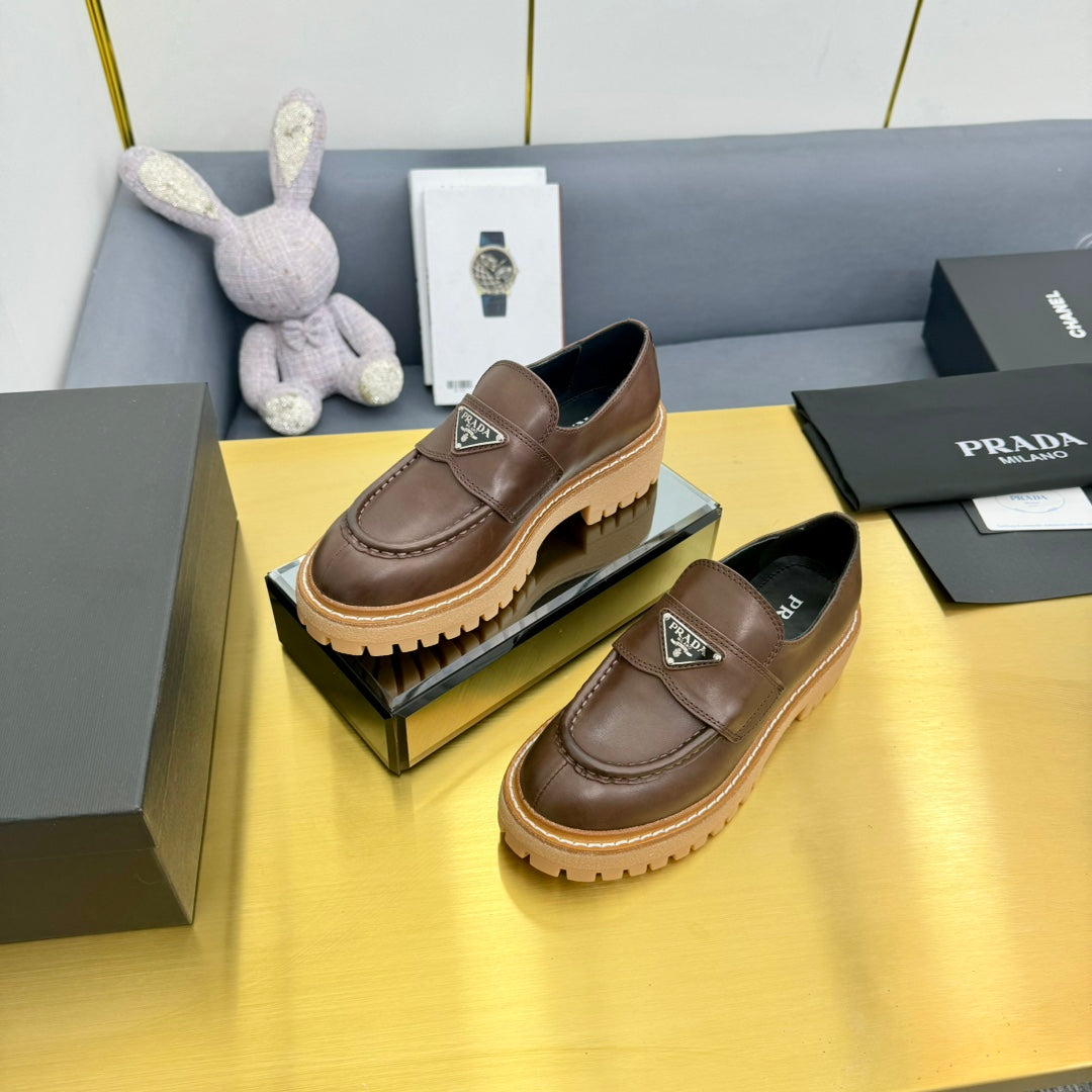 LOAFER WITH TRIANGLE LOGO IN CHOCOLATE BROWN CALFSKIN