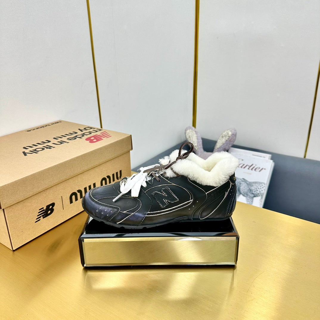 MIUXNB 530 SNEAKERS IN BLACK CALFSKIN SHEARLING
