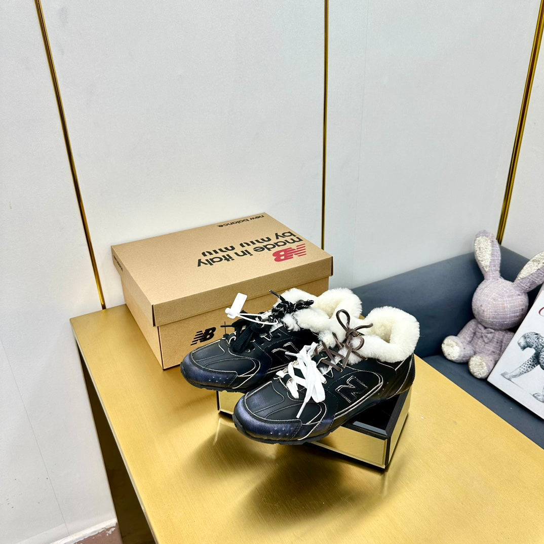 MIUXNB 530 SNEAKERS IN BLACK CALFSKIN SHEARLING