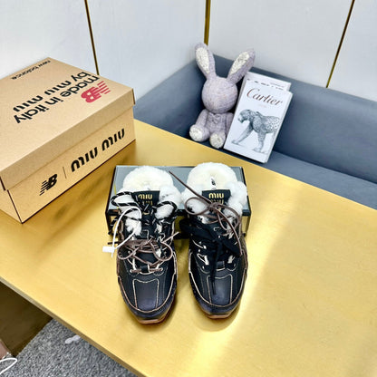 MIUxNB 530 SNEAKER MULES IN BLACK CALFSKIN SHEARLING