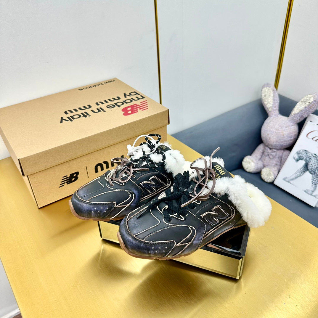 MIUxNB 530 SNEAKER MULES IN BLACK CALFSKIN SHEARLING