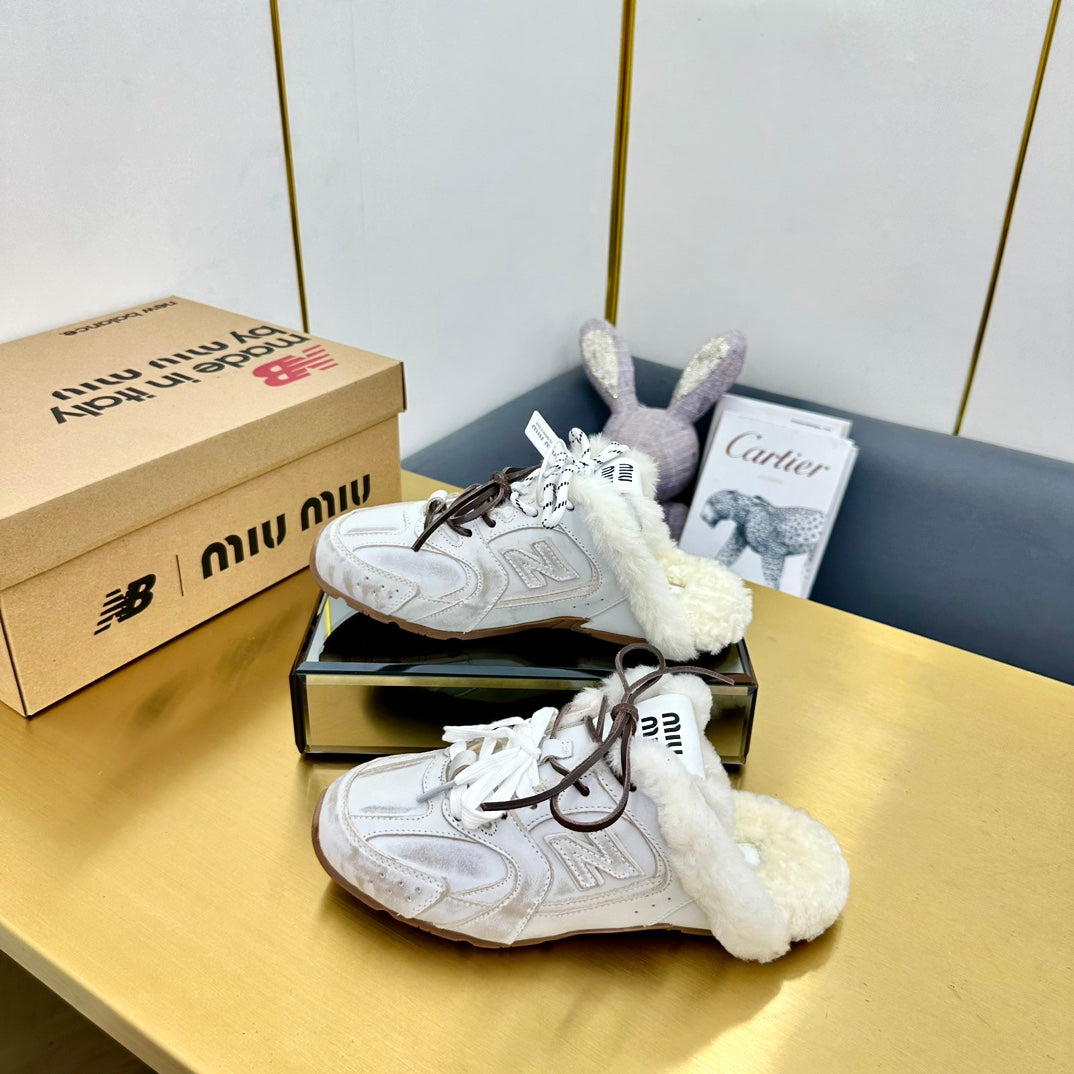 MIUxNB 530 SNEAKER MULES IN DISTRESSED WHITE CALFSKIN SHEARLING