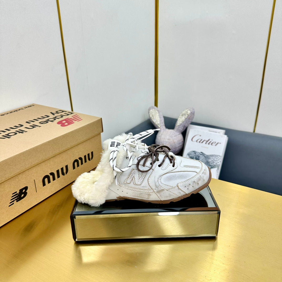 MIUxNB 530 SNEAKER MULES IN DISTRESSED WHITE CALFSKIN SHEARLING