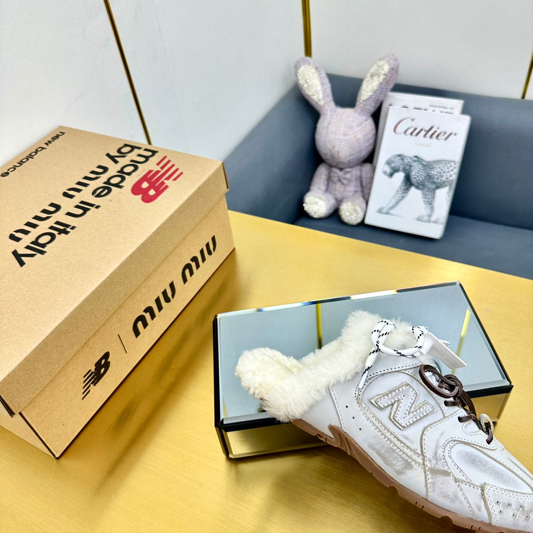 MIUxNB 530 SNEAKER MULES IN DISTRESSED WHITE CALFSKIN SHEARLING