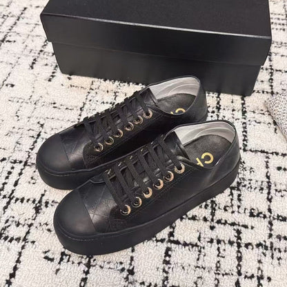 BISCUIT SNEAKERS IN BLACK CALFSKIN