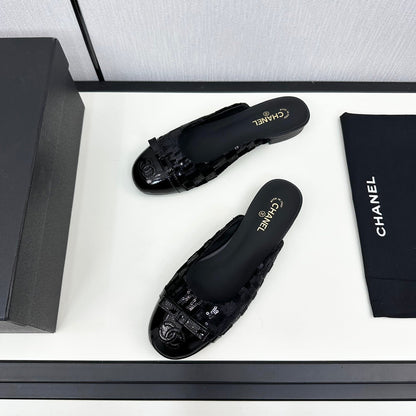 BOW MULE IN BLACK FABRIC AND CALFSKIN