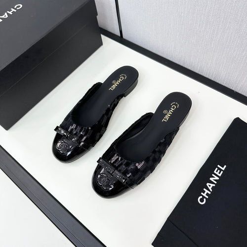 BOW MULE IN BLACK FABRIC AND CALFSKIN