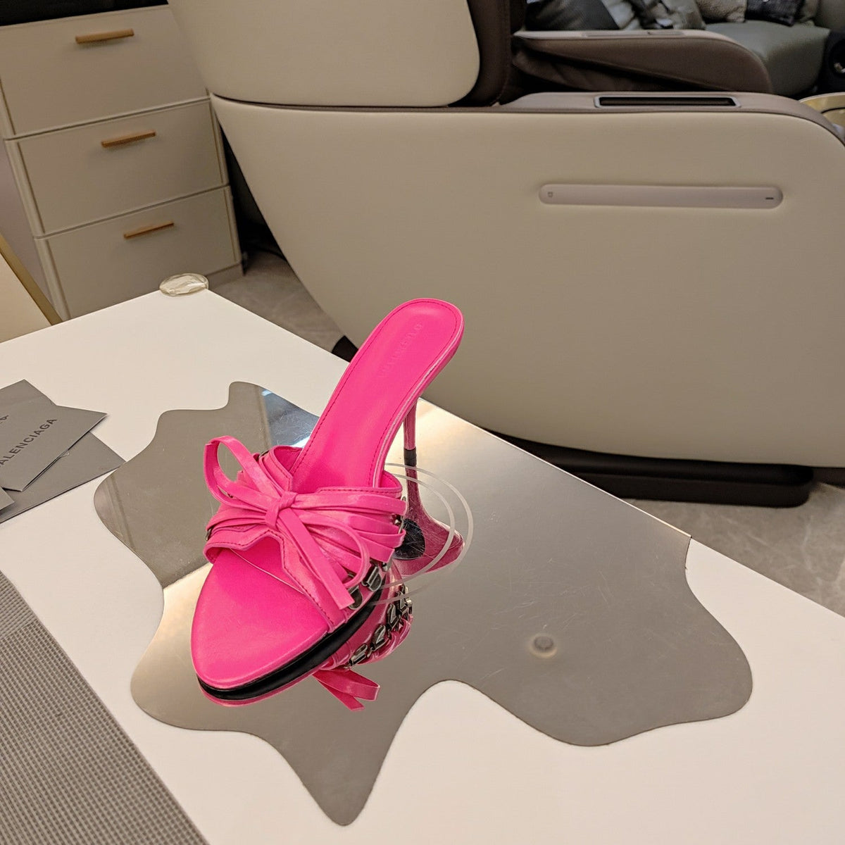 BOW-EMBELLISHED HIGH MULES IN HOT PINK SHEEPSKIN