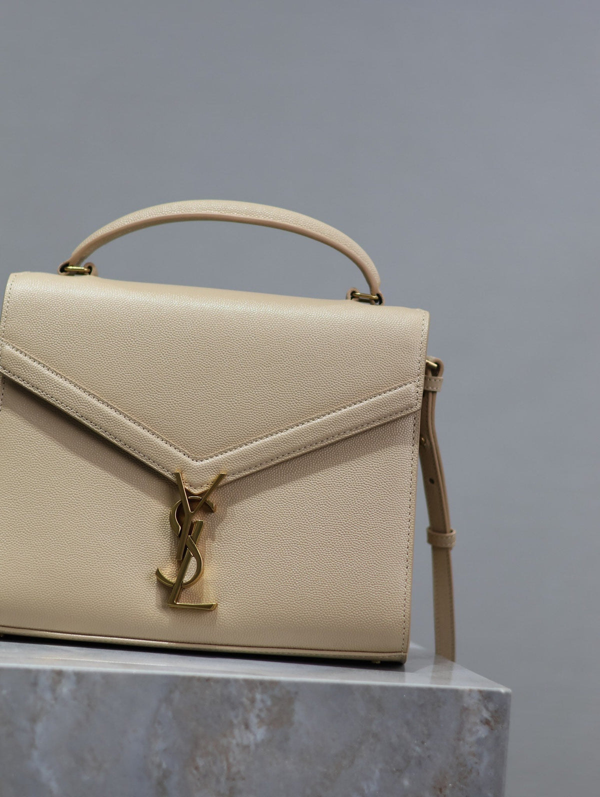 YSL CASSANDRA TOP HANDLE BAG MEDIUM IN BEIGE CALFSKIN GOLD HARDWARE