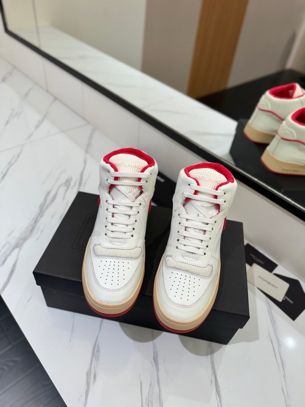 MID-TOP SNEAKERS IN WHITE AND RED TRIM PERFORATED LAMBSKIN