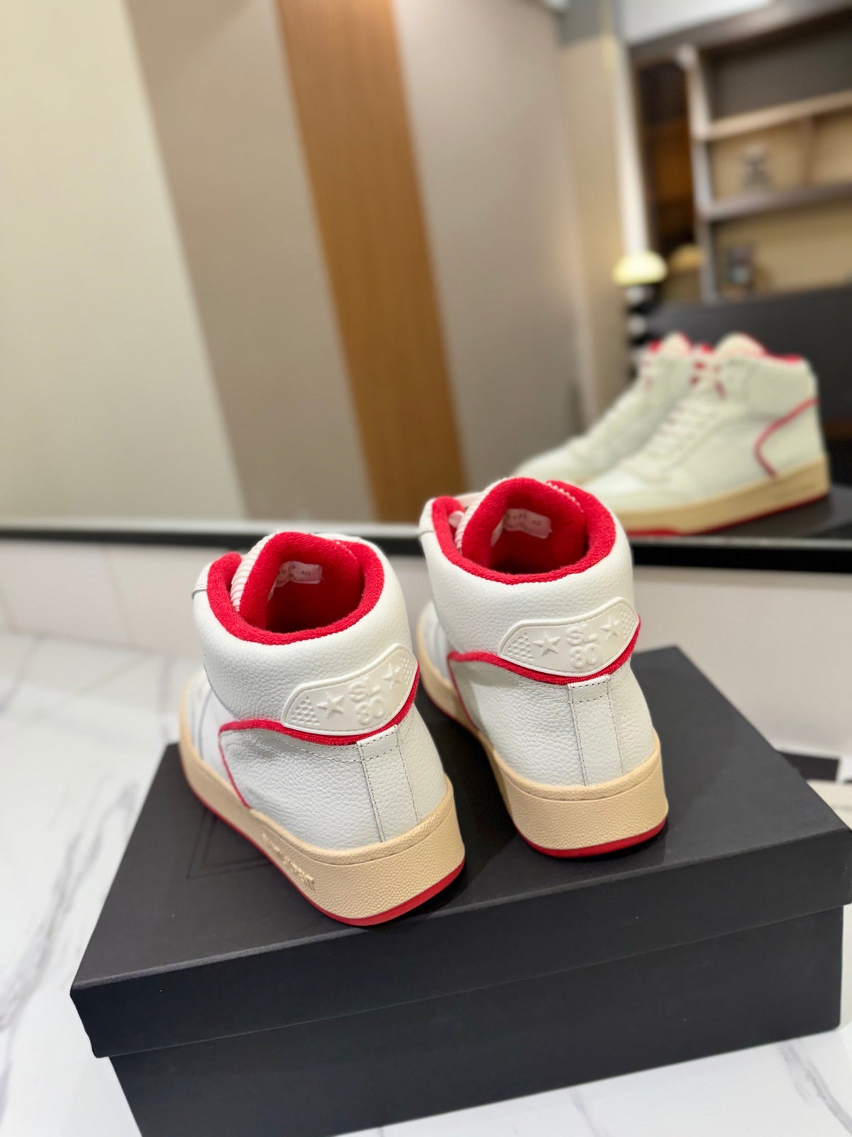 MID-TOP SNEAKERS IN WHITE AND RED TRIM PERFORATED LAMBSKIN