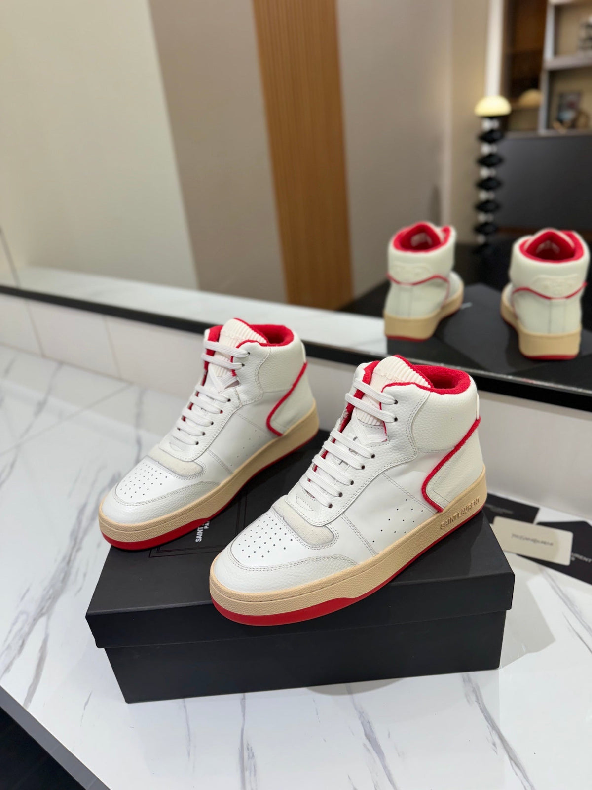 MID-TOP SNEAKERS IN WHITE AND RED TRIM PERFORATED LAMBSKIN