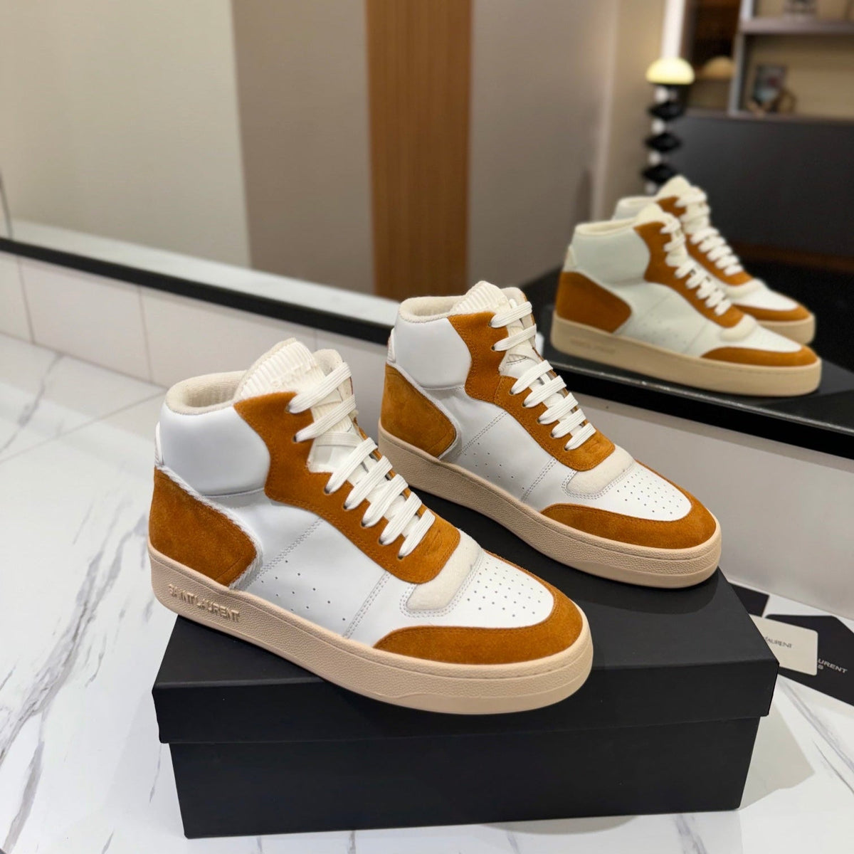 MID-TOP SNEAKERS IN WHITE PERFORATED LAMBSKIN AND BRONZE ORANGE SUEDE