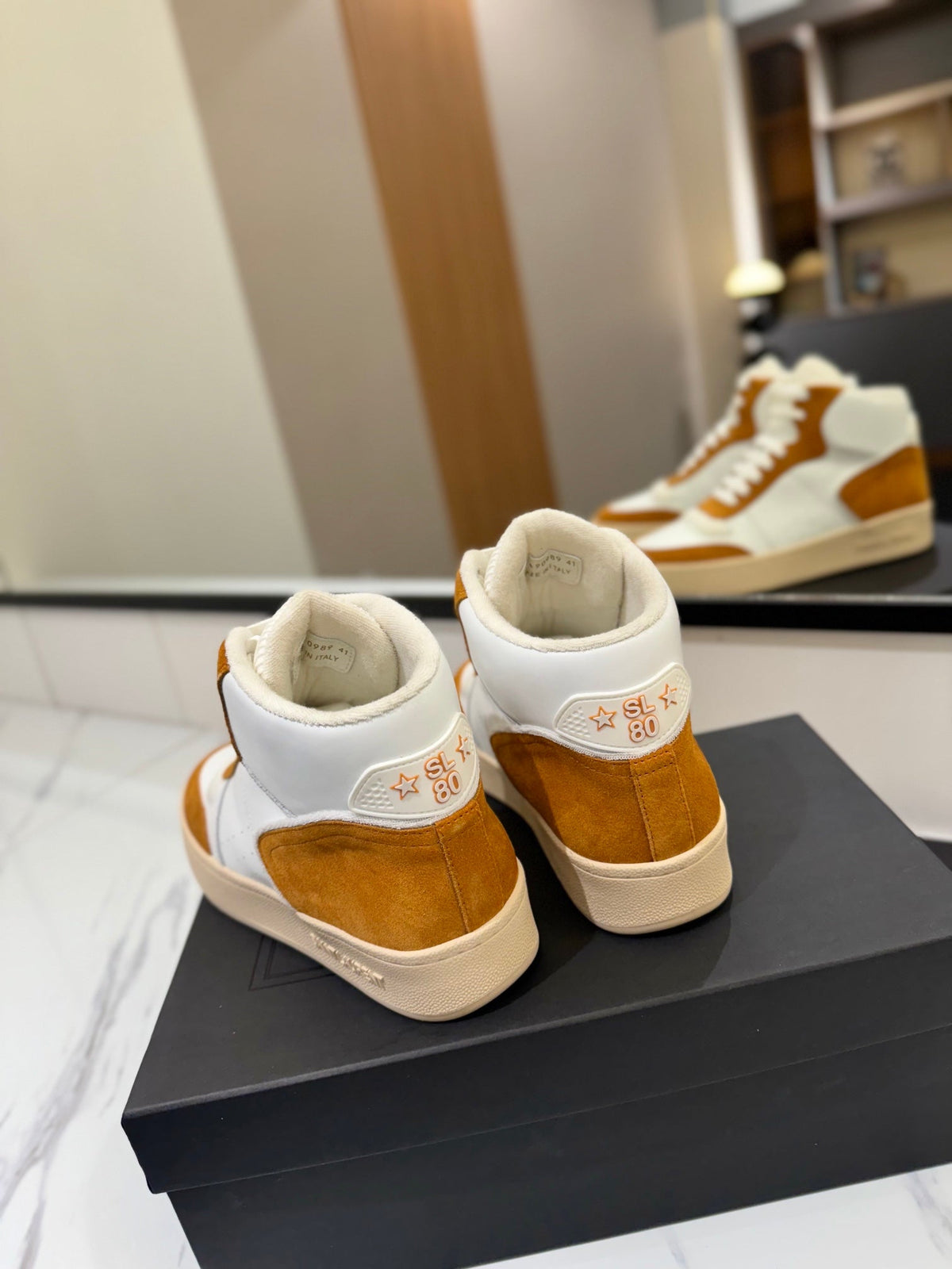 MID-TOP SNEAKERS IN WHITE PERFORATED LAMBSKIN AND BRONZE ORANGE SUEDE