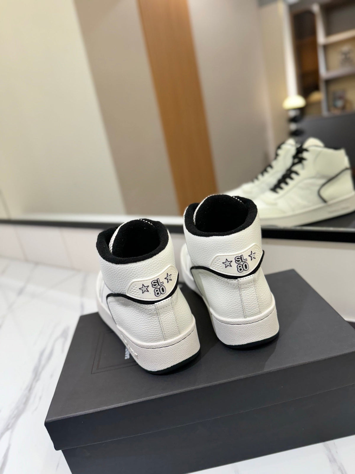 MID-TOP SNEAKERS IN WHITE AND BLACK TRIM PERFORATED LAMBSKIN