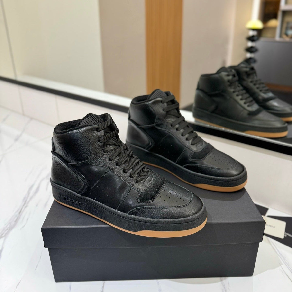 MID-TOP SNEAKERS IN BLACK PERFORATED LAMBSKIN