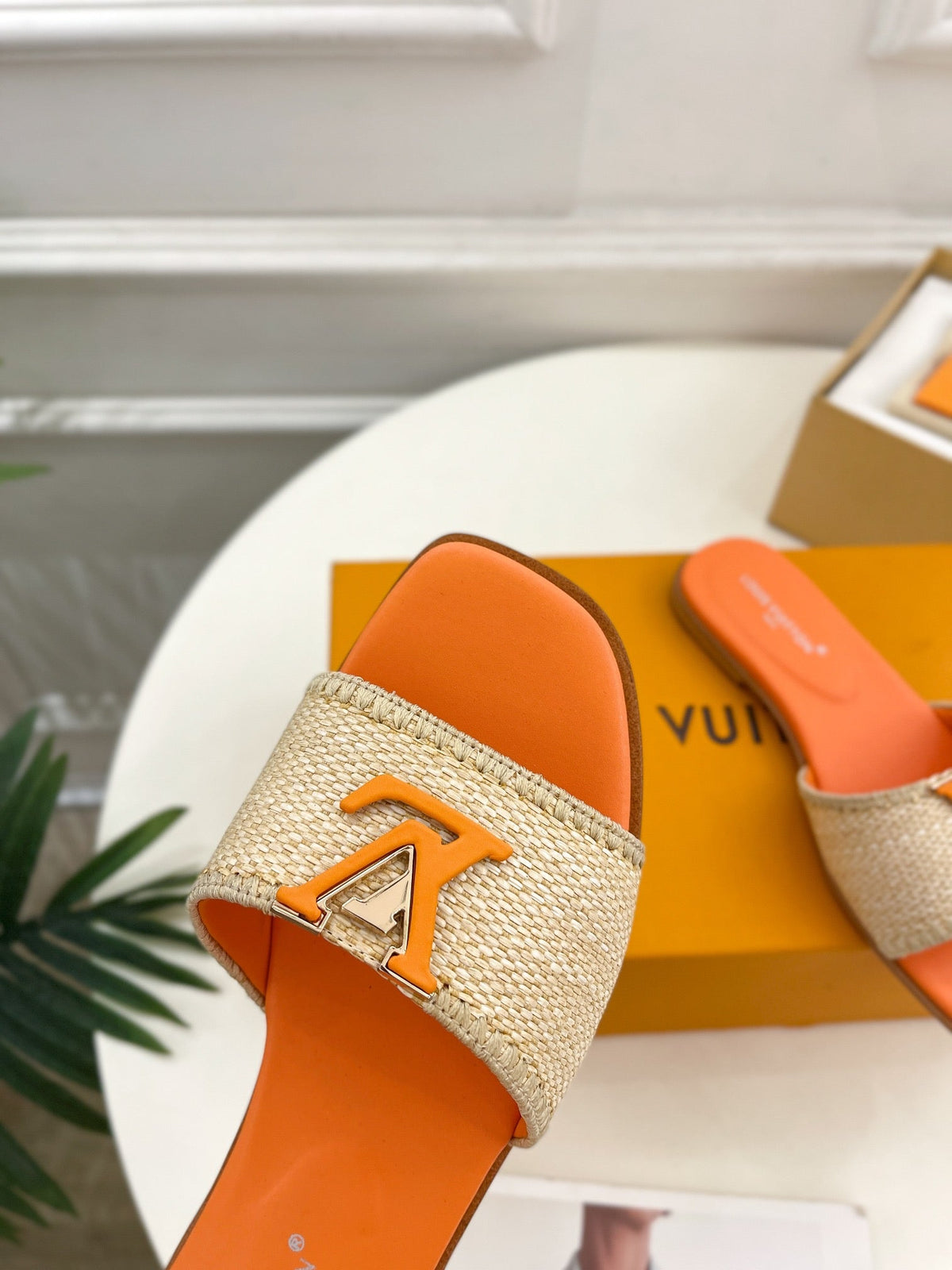 LV WOMEN CAPRI FLAT MULES IN TIGER ORANGE LEATHER AND RAFFIA