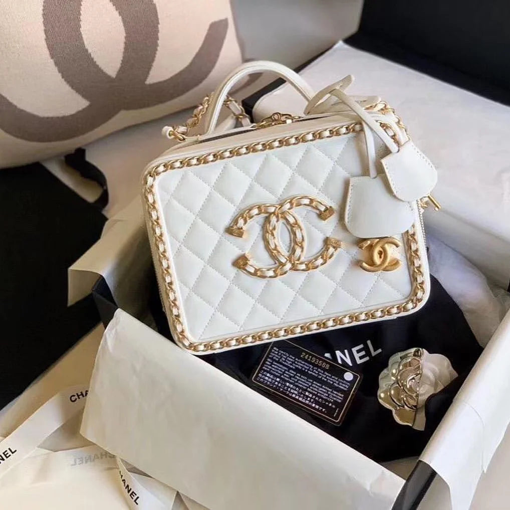 Chanel Filigree Vanity Case Quilted Caviar Gold – White