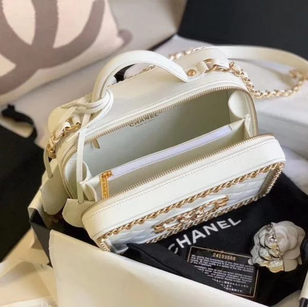 Chanel Filigree Vanity Case Quilted Caviar Gold – White