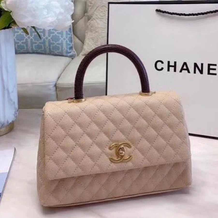 Chanel Grained Calfskin Maxi Flap Bag with Top Handle